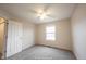 Standard bedroom featuring neutral walls, carpeted floors, a window, and a closet at 436 N Shore Ct, Franklin, IN 46131