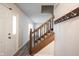 Welcoming entryway with hardwood floors and a staircase leading to the upper level at 436 N Shore Ct, Franklin, IN 46131
