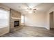 Spacious living room featuring a brick fireplace, a large window and tile flooring at 436 N Shore Ct, Franklin, IN 46131