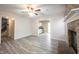 Spacious open living room with new floors leads into the kitchen and stairway at 436 N Shore Ct, Franklin, IN 46131