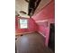 Attic bedroom with pink walls and wood flooring at 439 N Colorado Ave, Indianapolis, IN 46201