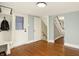Open entryway with coat storage, leading to the staircase at 4517 Central Ave, Indianapolis, IN 46205