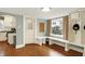 Mudroom with built in storage and bench seating leading to the kitchen and laundry room at 4517 Central Ave, Indianapolis, IN 46205