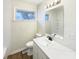 Bright bathroom with updated fixtures, stylish vanity, and a clean, modern design at 4721 N Longworth Ave, Indianapolis, IN 46226