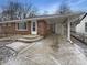 Charming single-story brick home with carport and well-maintained front yard at 4721 N Longworth Ave, Indianapolis, IN 46226