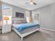 Bright bedroom featuring soft carpet, neutral paint and decor, and ensuite bathroom at 5003 Lilium Dr, Plainfield, IN 46168