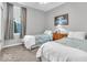 Comfortable bedroom with twin beds, carpet flooring, and natural light at 5003 Lilium Dr, Plainfield, IN 46168