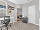 Comfortable office space with neutral carpet, large windows, and a workspace at 5003 Lilium Dr, Plainfield, IN 46168