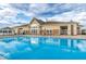 Sparkling community pool with ample seating, complemented by a gazebo for a relaxing poolside experience at 5003 Lilium Dr, Plainfield, IN 46168