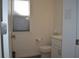 Powder room featuring modern toilet and vanity with storage at 5303 Rum Cherry Way, Indianapolis, IN 46237