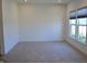 Bright bedroom featuring neutral carpeting, recessed lighting and double windows at 5303 Rum Cherry Way, Indianapolis, IN 46237
