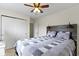 Bedroom featuring a ceiling fan, carpet, and closet at 5832 Emmert Way, Indianapolis, IN 46221