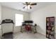 Bedroom with a carpeted floor, ceiling fan, and large desk perfect for a home office at 5832 Emmert Way, Indianapolis, IN 46221
