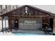 Close-up of a barn style garage with faded paint and a basketball hoop at 6910 S 175 W, Columbus, IN 47201