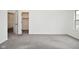 Bedroom with neutral carpet and a walk-in closet with custom shelving at 7044 Bel Moore Cir, Indianapolis, IN 46259