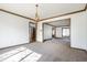 Open-concept living room boasts abundant natural light and seamless flow between spaces at 7411 Perrier Dr, Indianapolis, IN 46278