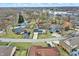 A high-angle aerial view shows the property in relation to the surrounding neighborhood and trees at 803 Hickory Way, Noblesville, IN 46062