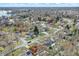 An aerial shot shows a residential neighborhood with mature trees and a winding street at 803 Hickory Way, Noblesville, IN 46062