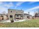 Expansive backyard with a pergola over a patio area, seating, and lawn at 803 Hickory Way, Noblesville, IN 46062