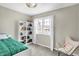 Bedroom with bookshelf and chair at 803 Hickory Way, Noblesville, IN 46062
