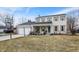 Charming two-story home features a brick facade, attached garage, and front porch with swing at 803 Hickory Way, Noblesville, IN 46062