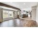 Spacious living room with hardwood floors, large windows, and natural light at 803 Hickory Way, Noblesville, IN 46062