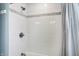 Shower features white subway tile with decorative band and modern fixtures at 803 Hickory Way, Noblesville, IN 46062