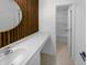Bathroom featuring a decorative mirror, sink with a large counter, and a shower and tub combo at 8310 Bearberry Ln, Pendleton, IN 46064