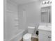 Bathroom featuring a shower and tub combo, toilet, and sink with a bright vanity at 8310 Bearberry Ln, Pendleton, IN 46064
