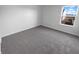 Bedroom featuring carpeted floors, a window that fills the room with light, and neutral paint at 8310 Bearberry Ln, Pendleton, IN 46064