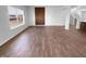 Bright and airy living room featuring hardwood floors and modern design elements at 8310 Bearberry Ln, Pendleton, IN 46064