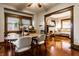 Inviting dining room with hardwood floors, modern furnishings, and seamless flow to the living area at 85 N Dearborn St, Indianapolis, IN 46201