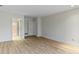 Bedroom featuring an open doorway, white walls and light wood floors at 8751 Jaffa Court E Dr # 17, Indianapolis, IN 46260