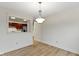 Open-concept area featuring a view to the kitchen and bright natural light at 8751 Jaffa Court E Dr # 17, Indianapolis, IN 46260