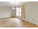 Bright living room featuring neutral walls, wood floors and natural light at 8751 Jaffa Court E Dr # 17, Indianapolis, IN 46260