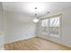 Bright living room featuring neutral walls, wood floors and natural light at 8751 Jaffa Court E Dr # 17, Indianapolis, IN 46260
