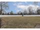 Expansive backyard enclosed by a white fence, offering privacy and a large open space at 8929 Lantern Ln, Indianapolis, IN 46256