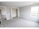 Bedroom with a window and access to a walk-in closet, offering ample storage and natural light at 9078 N River Chase Ln, McCordsville, IN 46055