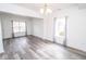 Bright living space with ample natural light, modern floors, and neutral décor at 9078 N River Chase Ln, McCordsville, IN 46055