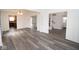 Bright and airy living room featuring updated flooring and an open floor plan at 9078 N River Chase Ln, McCordsville, IN 46055