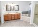 The main bathroom features double sinks, a soaking tub, and a separate glass-enclosed shower at 9078 N River Chase Ln, McCordsville, IN 46055