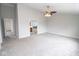 Large main bedroom featuring neutral carpet, a ceiling fan with lights, and doorway to the ensuite bathroom at 9078 N River Chase Ln, McCordsville, IN 46055