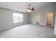 The main bedroom offers a large window for natural light and easy access to the walk-in closet at 9078 N River Chase Ln, McCordsville, IN 46055