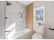 Bathroom featuring a tiled shower/tub and a window providing natural light at 10539 Mcpherson St, Carmel, IN 46280