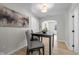 Comfortable dining room with a view, featuring elegant décor and neutral tones at 10539 Mcpherson St, Carmel, IN 46280