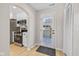 Well-lit kitchen shows stainless steel appliances and easy access to an exterior door at 10539 Mcpherson St, Carmel, IN 46280