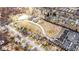 Expansive aerial view showcasing neighborhood layout, homes, and surrounding greenery at 1148 Easy St # B, Greenwood, IN 46142