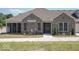 Charming brick home with well-maintained landscaping and welcoming front entrance at 1148 Easy St # B, Greenwood, IN 46142