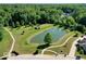 Scenic aerial view of a pond and surrounding green space in a residential community at 1148 Easy St # B, Greenwood, IN 46142