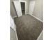 Comfortable bedroom featuring neutral carpet and a bright, airy feel at 1207 N Kealing Ave, Indianapolis, IN 46201